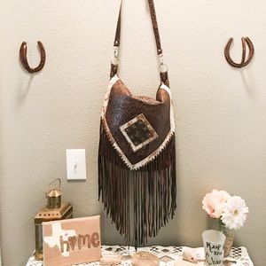 Leather purse with LV and cowhide accents